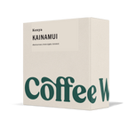 Coffee bag box, beige with green Kainamui and Kenya text on the front.